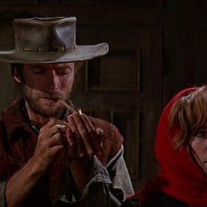 Foto Dos mulas y una mujer