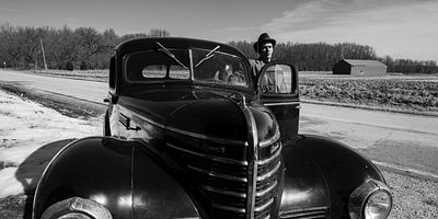 Cartel de East/We4st