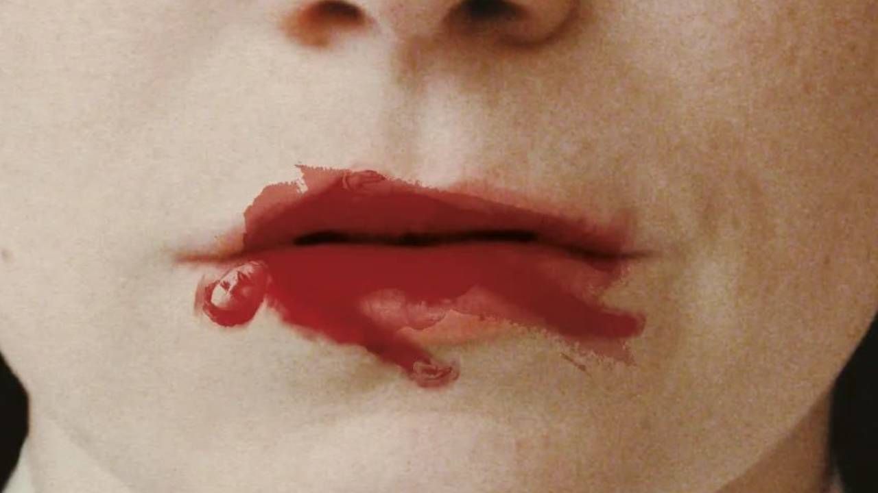 Detalle de los labios del póster